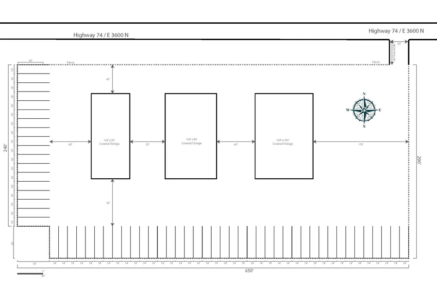 Site plan of a 650 by 240 foot lot on Highway 74 with three covered storage buildings, rows of parking stalls, dimensions, and a compass rose.